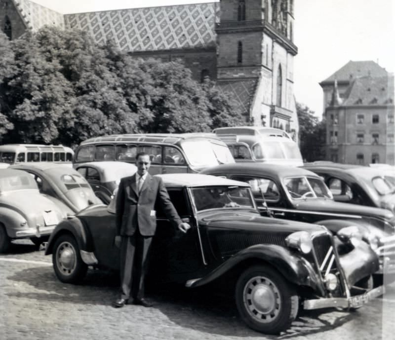 Man with Citroën 11 CV Cabriolet in Basel, French plates, 1950