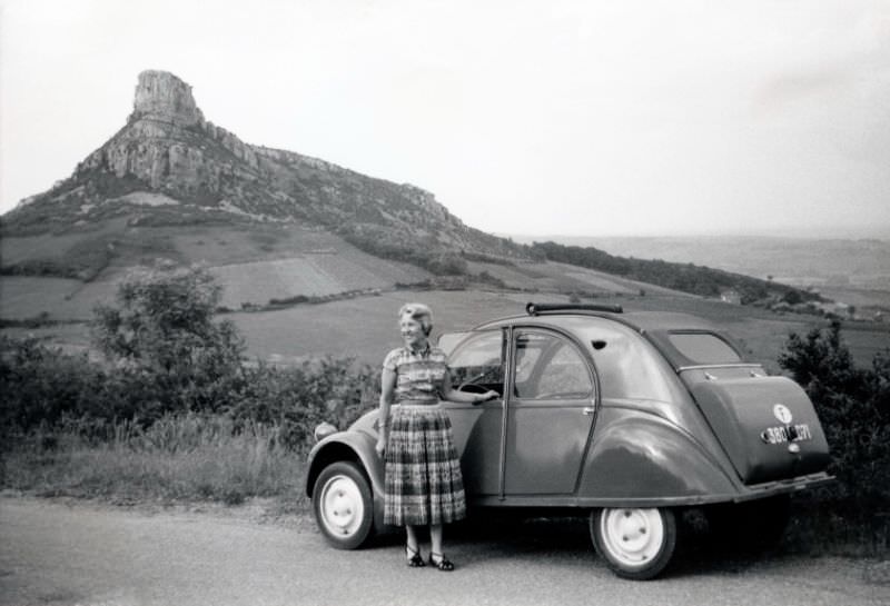 Lady with Citroën 2 CV in countryside, Saône-et-Loire registration, June 1, 1955