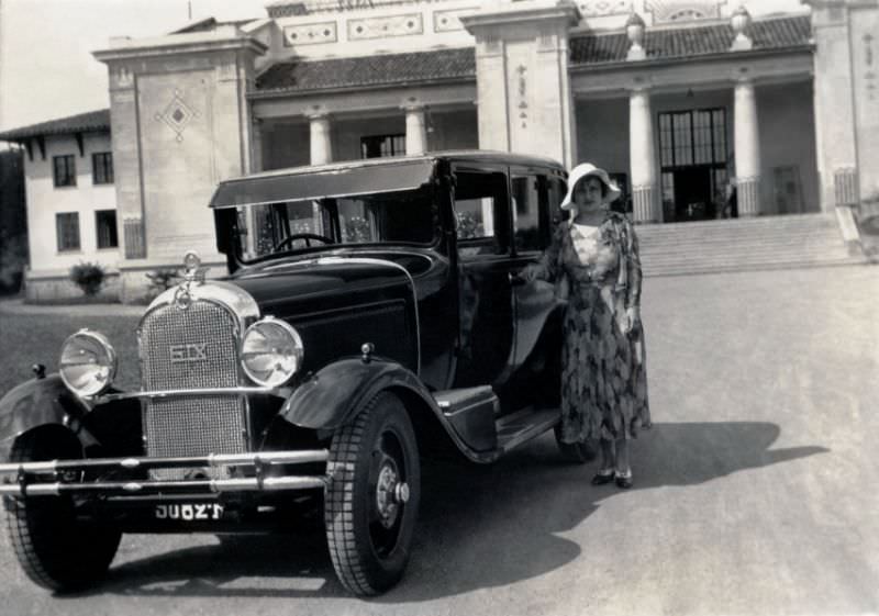 Lady with Citroën C6 in front of Art Nouveau building, 1930