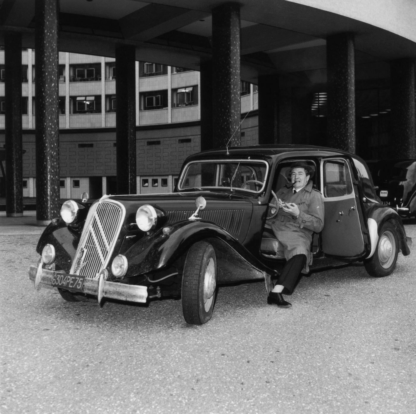 Rupert Davies, who played Inspector Maigret, with the Citroën Traction Avant car used in the television series, 1963.