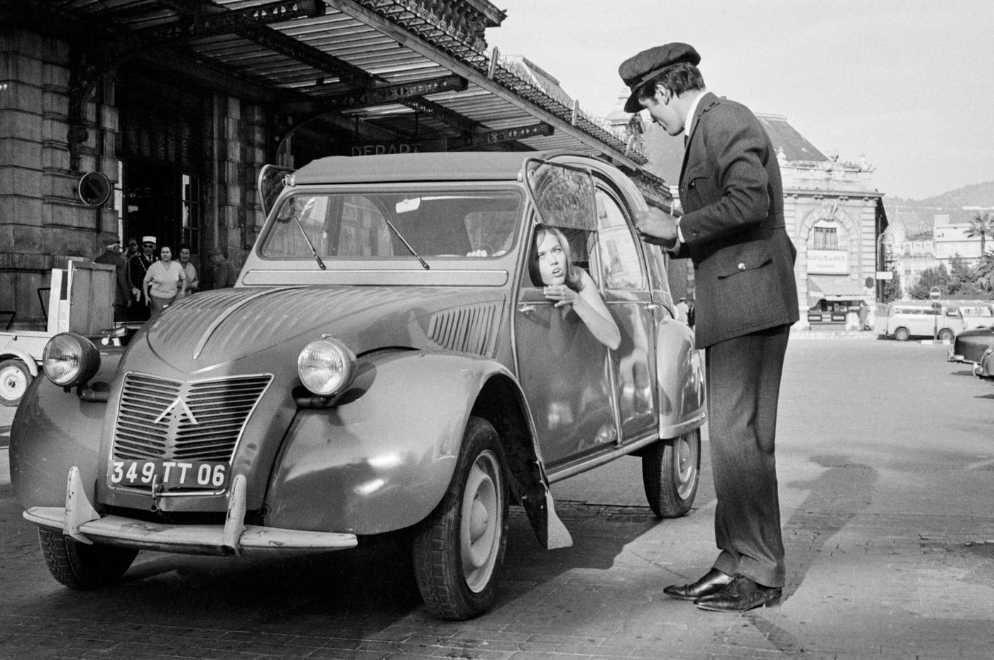 Jane Fonda and Alain Delon in a Citroën 2CV during the filming of "Les Félins" on the French Riviera, 1963.