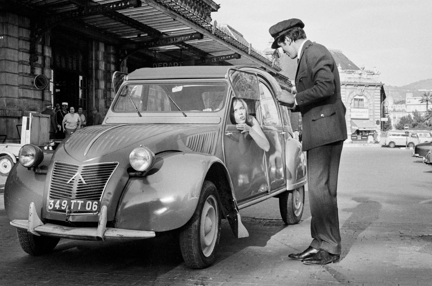 Jane Fonda and Alain Delon in a Citroën 2CV during the filming of "Les Félins" on the French Riviera, 1963.