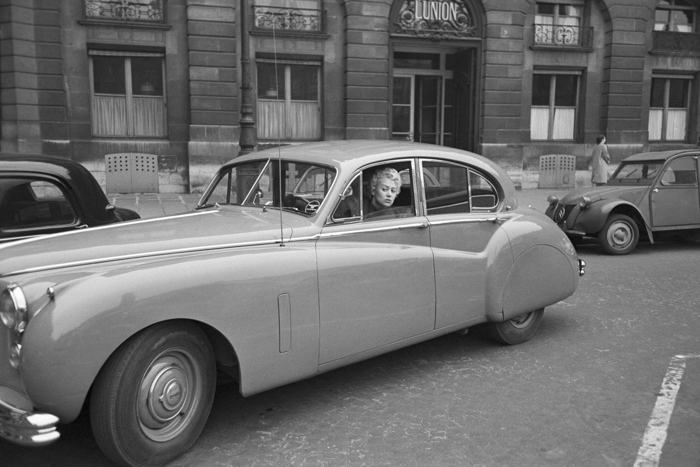 Close-Up Of Martine Carol Driving Citroën 2CV, 1954.