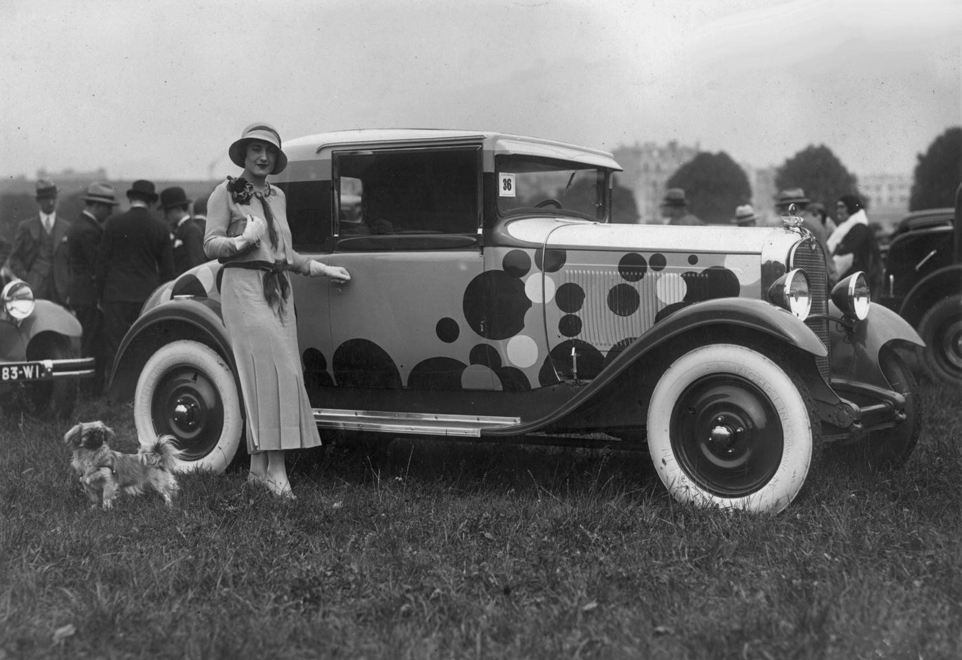Woman in Fashionable Dress Standing by Citroen Car with Dog, 1935.
