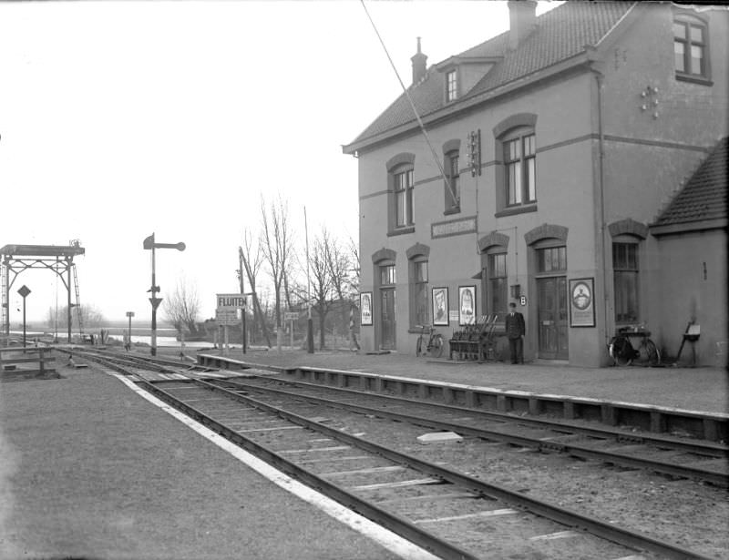 Vinkeveen station with the station master annex signal box keeper stood a bit stiffly in front of the door of his Post B, February 22, 1950