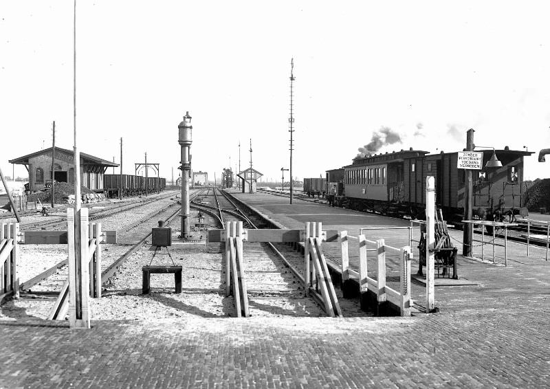 From behind the station building, the train to Amsterdam has been prepared, Aalsmeer, circa 1950