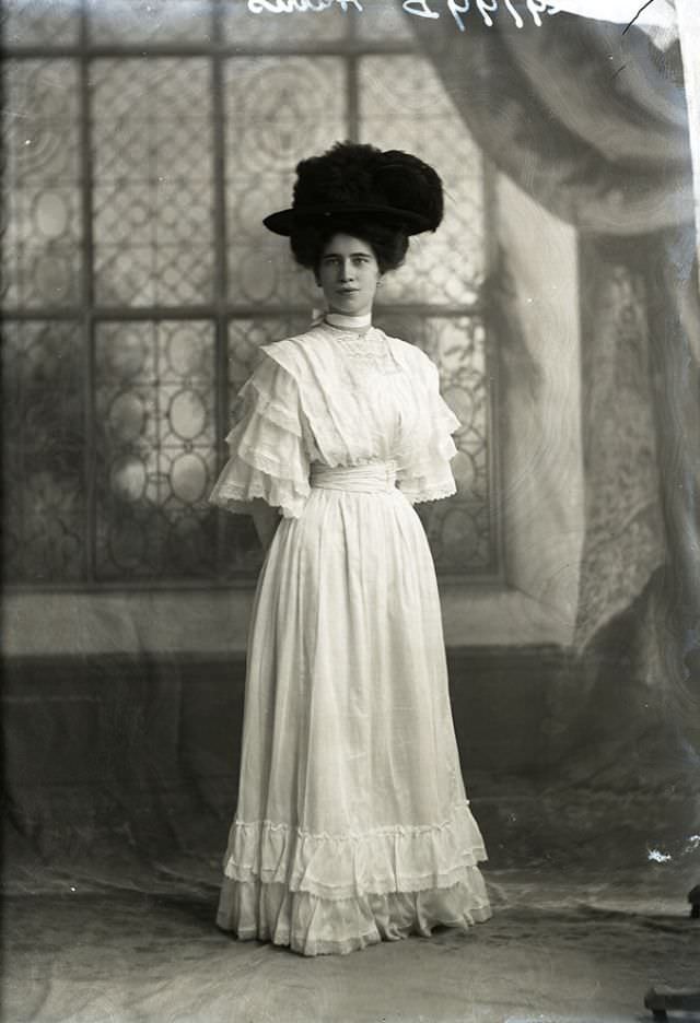 Miss E Harris poses for a portrait in 1908