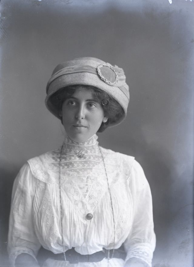 Miss Webber poses for a portrait circa 1900s