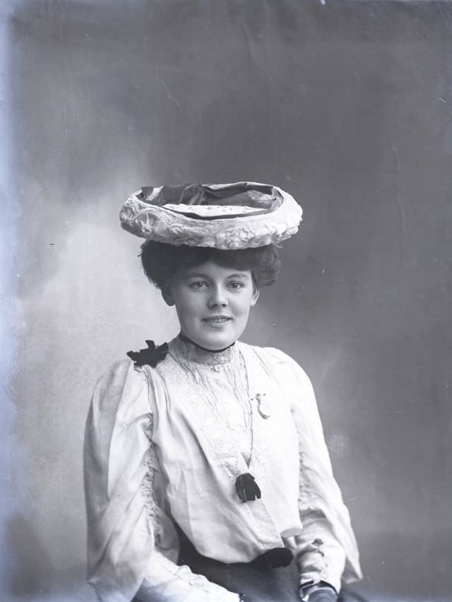 Miss Woodroffe poses for a portrait circa 1900s