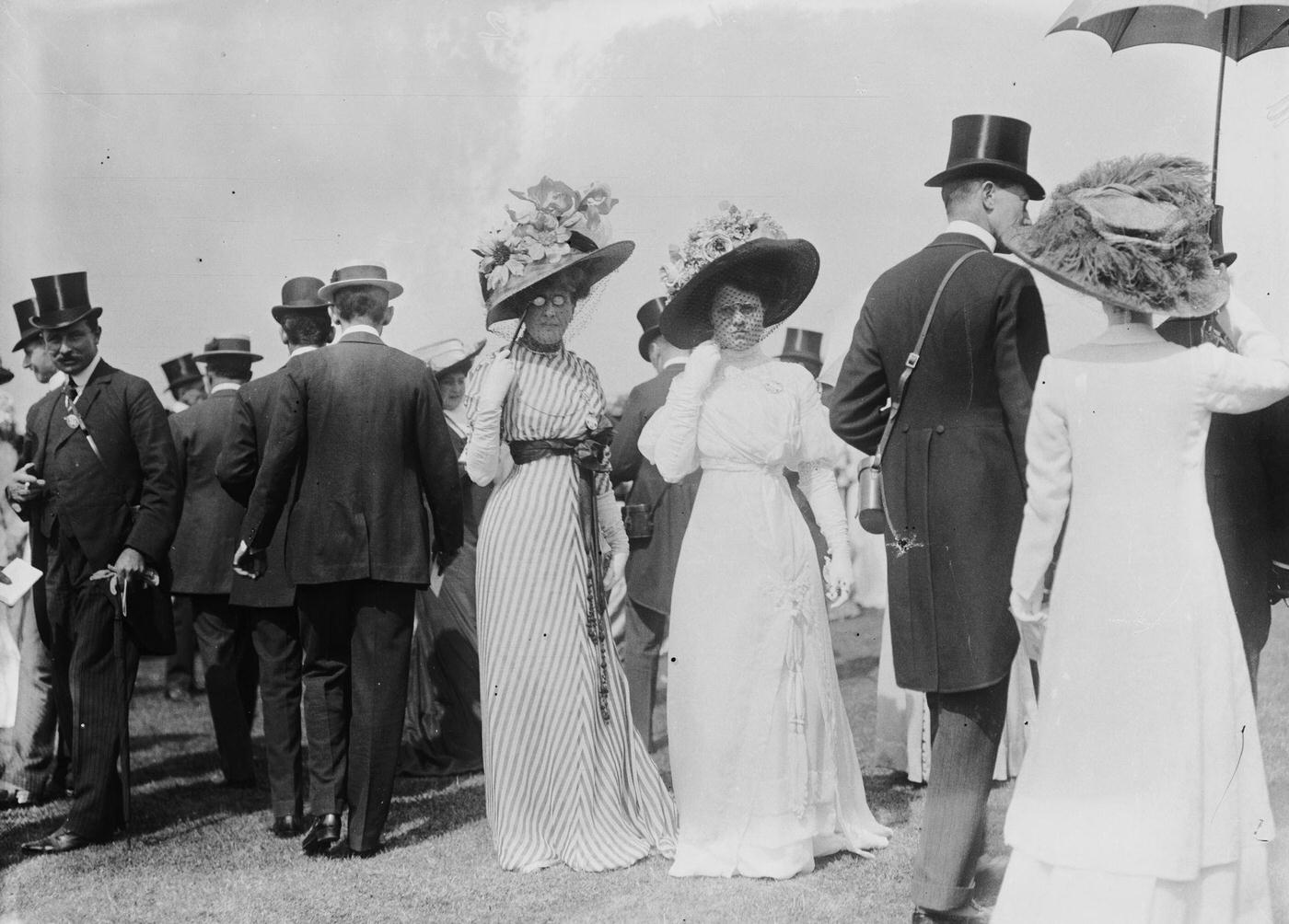 Edwardian ladies and gentlemen enjoy a day at the races on Derby Day