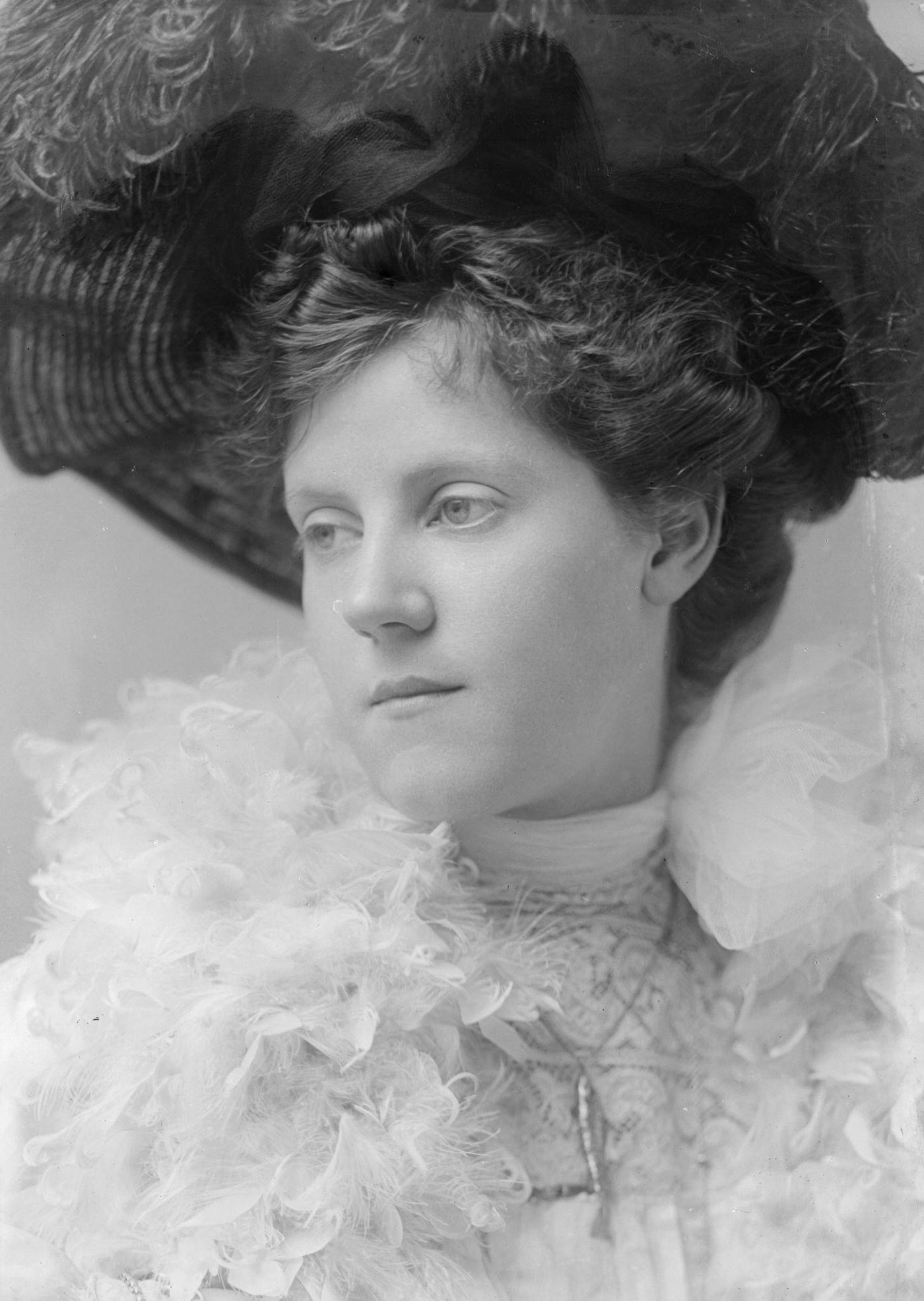 Miss V. Forrestor looks stunning in her feathered hat and boa in 1903