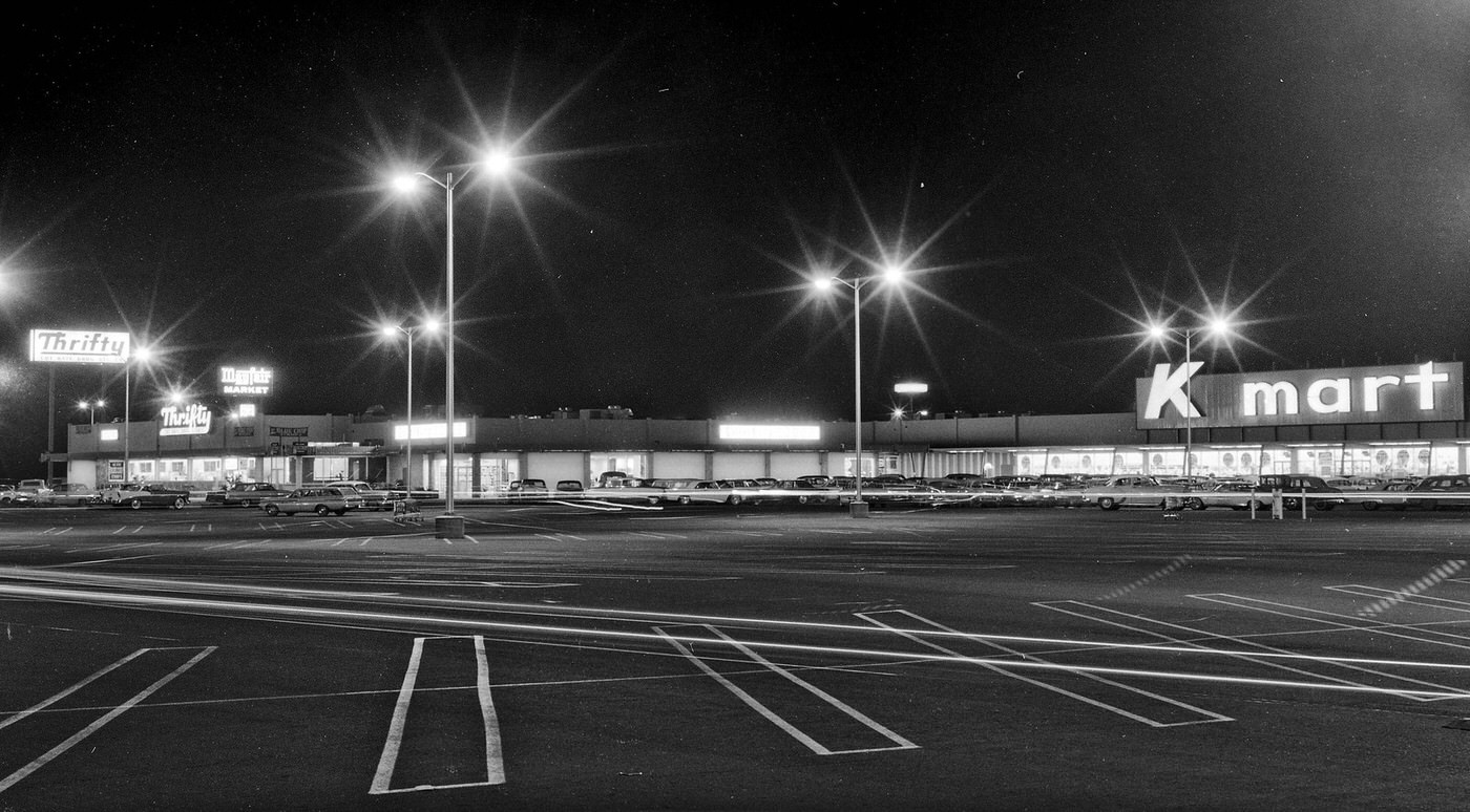 A 1964 evening view of the K-Mart shopping center at Kings Canyon Road (Hiway 180) and Chestnut Avenue in east Fresno California.