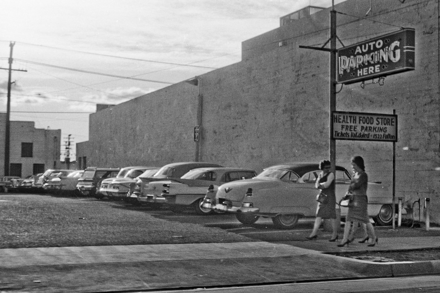 Somewhere northwest of old downtown Fresno. Address on sign for the Health Food Store reads 1522 Fulton.