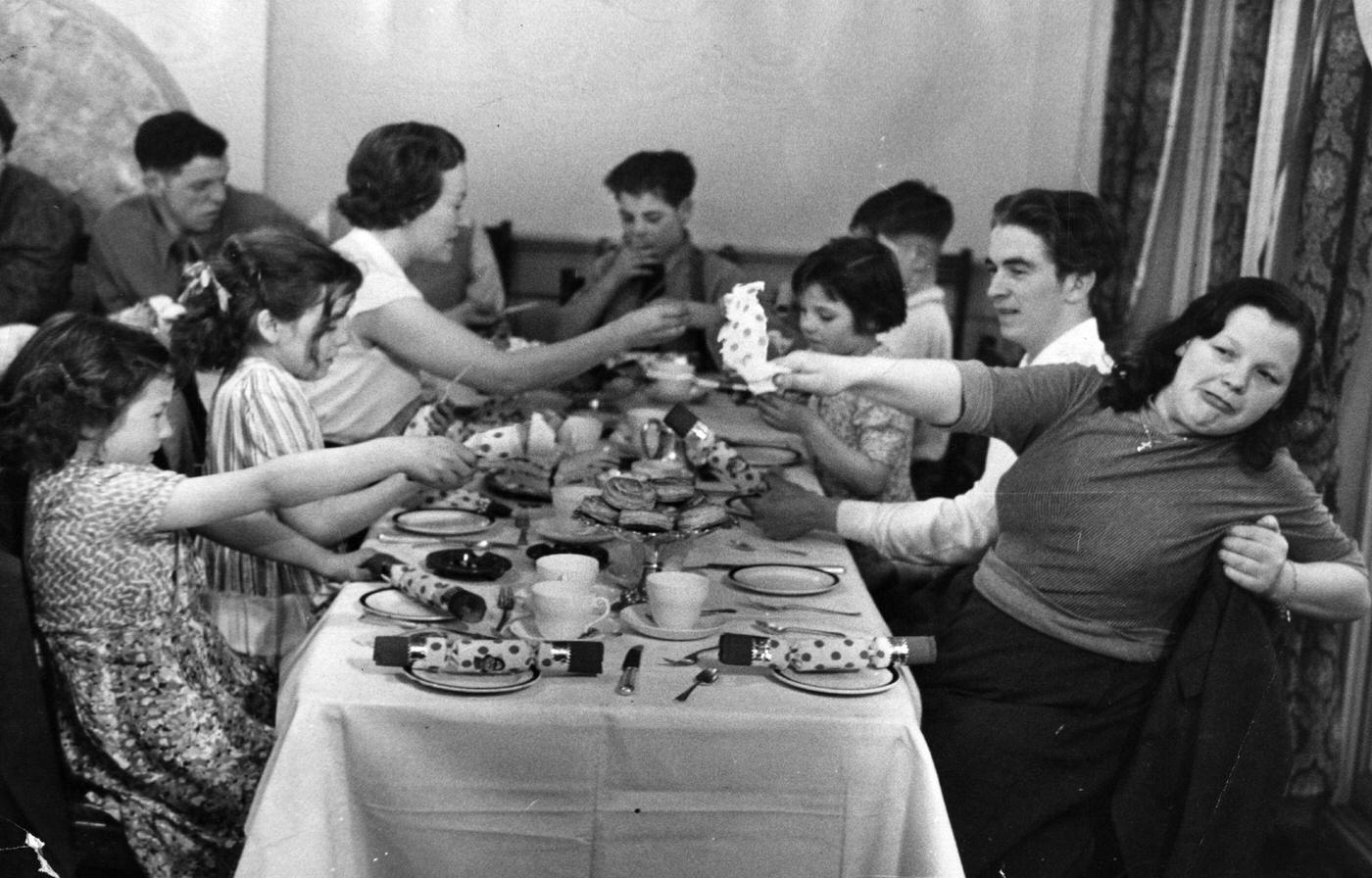 Some of the Hudson family's twenty children enjoying themselves at a Christmas lunch in Selfridges department store, London.