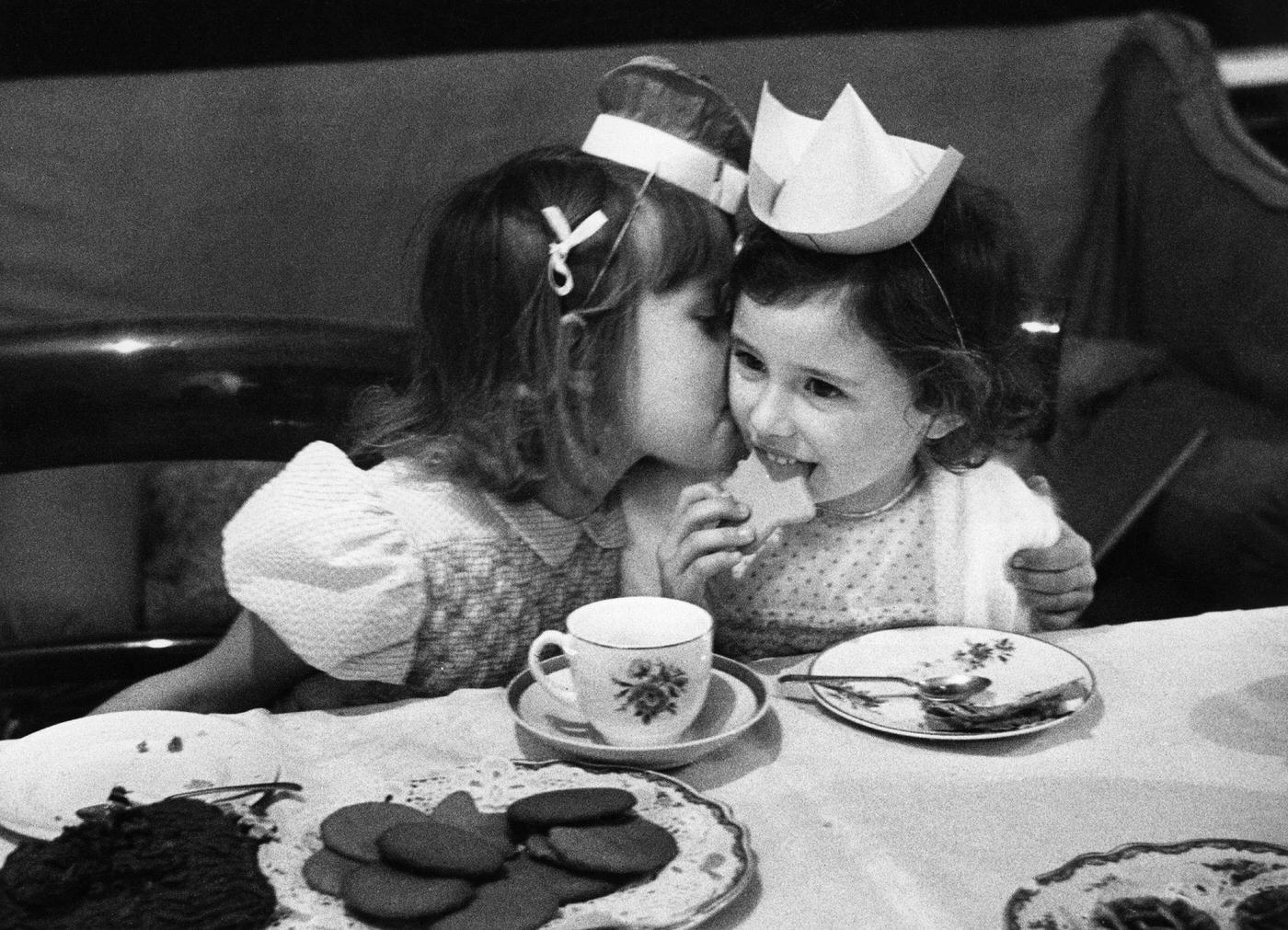 Children at a Christmas party find plenty to eat, despite the problems of rationing, 1951