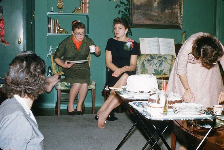 The party must have been going on for awhile, since two of the women have taken their shoes off. Last names are Grace, Minatel, Beazis and Oliver, 1950s