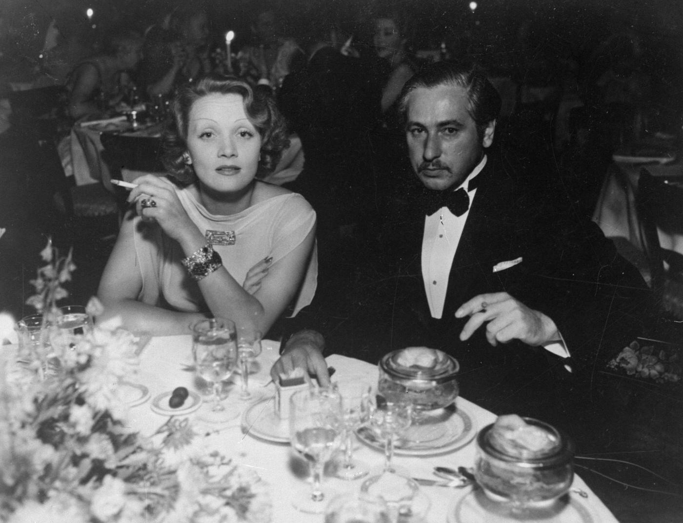 Marlene Dietrich dines with director Josef von Sternberg in 1935.