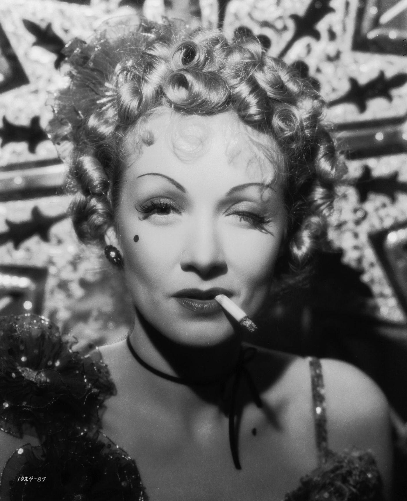 Marlene Dietrich plays Frenchy in a scene from the 1937 film 'Destry Rides Again.'