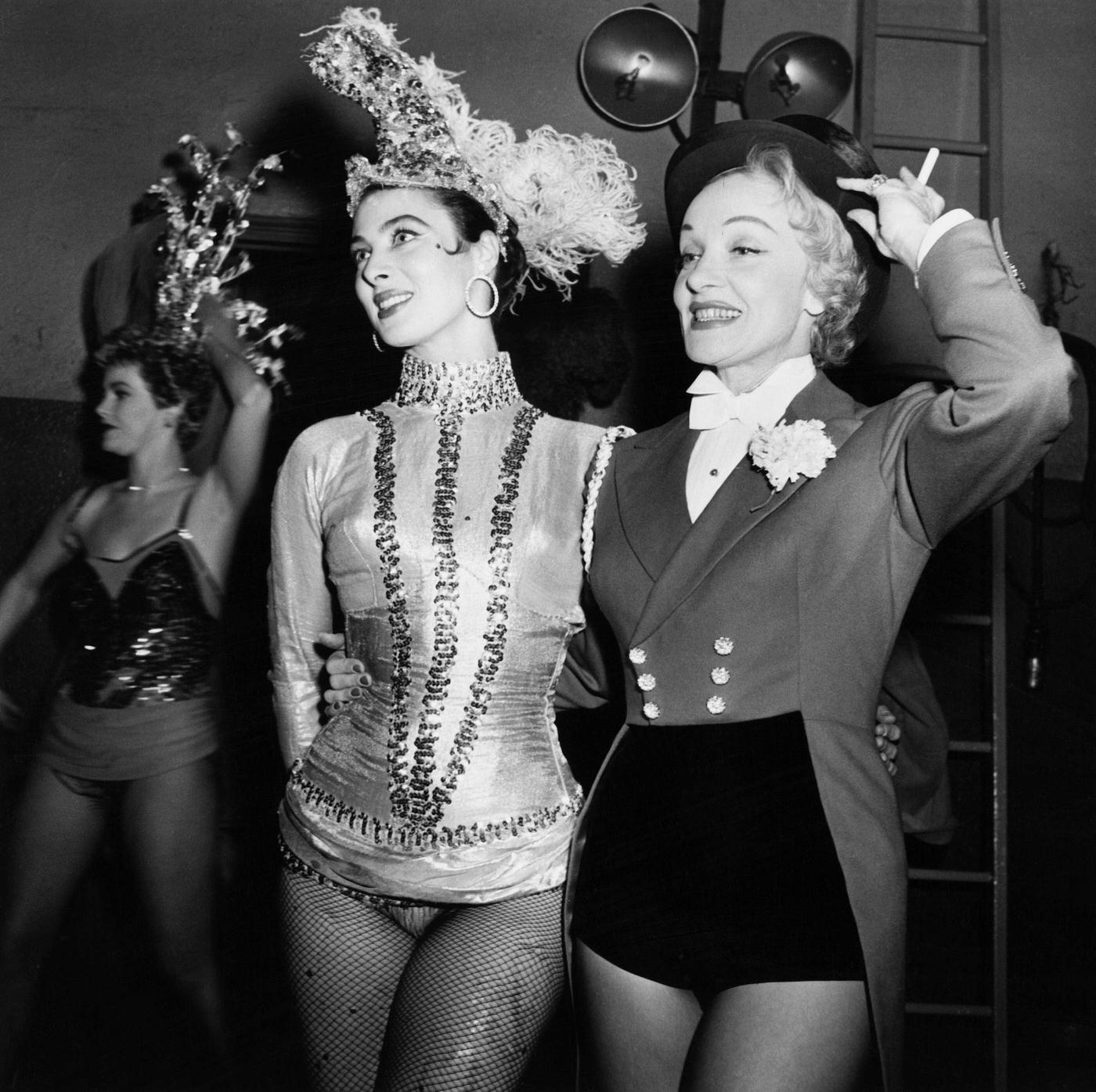 Rita Gam and Marlene Dietrich perform at the opening of a circus in New York City in 1952.