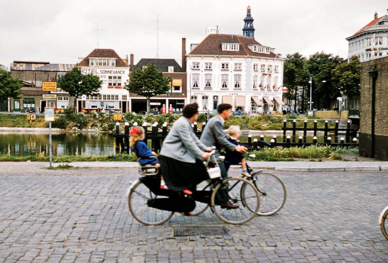 A family on bicycles on Kanaalweg, Middelburg, Netherlands.