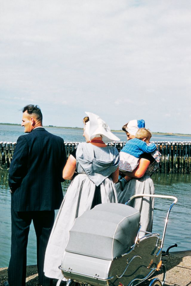 A Dutch family awaiting a ferry, Veere, Netherlands.