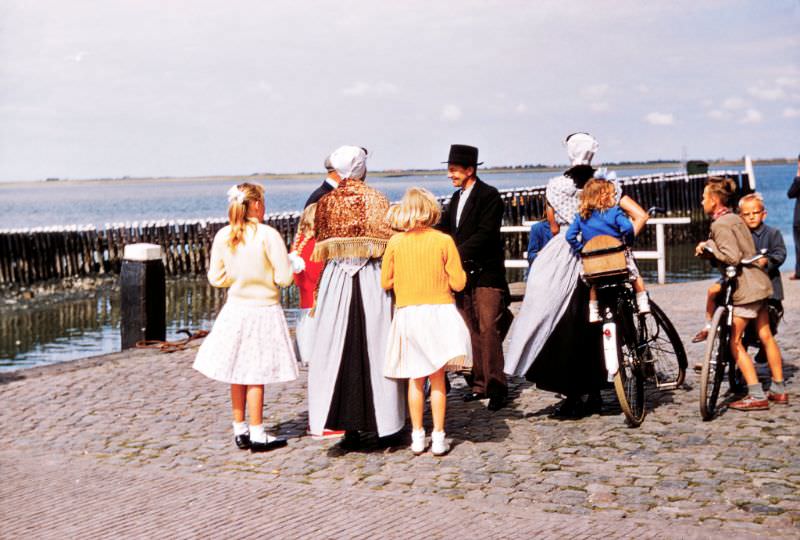 Dutch families awaiting a ferry, Veere, Netherlands.