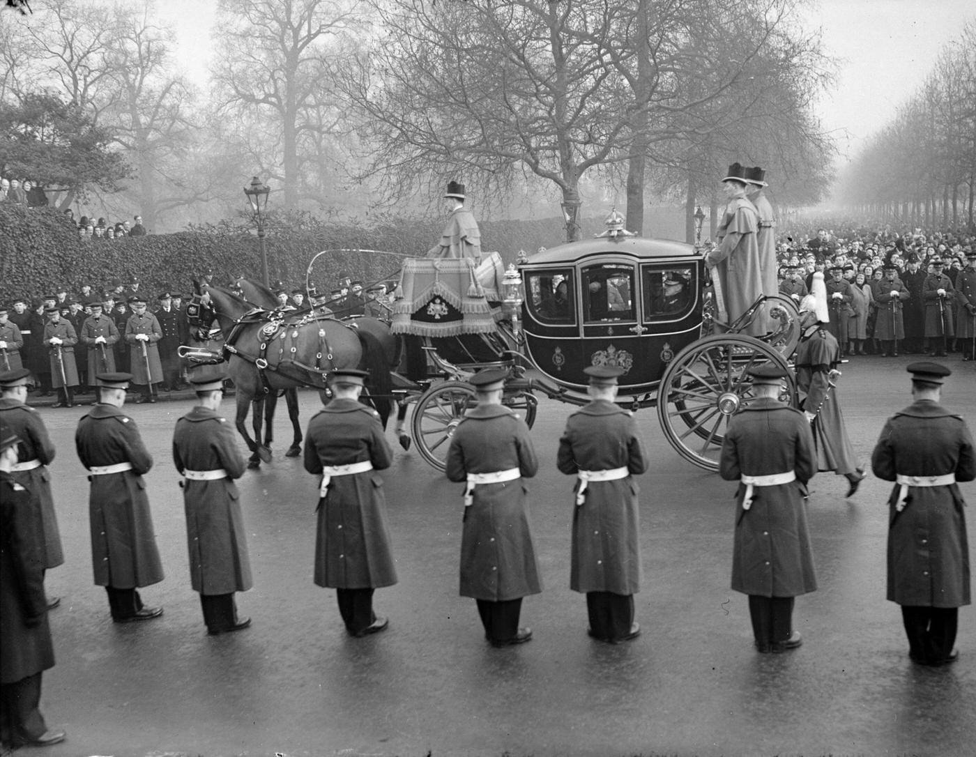 The carriage carrying Haakon VII, King of Norway, Queen Juliana of the Netherlands, the Duchess of Gloucester and the Duchess of Kent in the funeral procession of King George VI in the Mall.