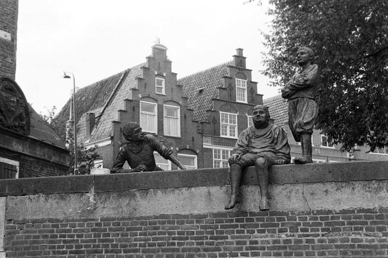 A sculpture of the three cabin boys inspired by the book of Dutch author Johan Fabricius at Hoorn, The Netherlands in 1971.
