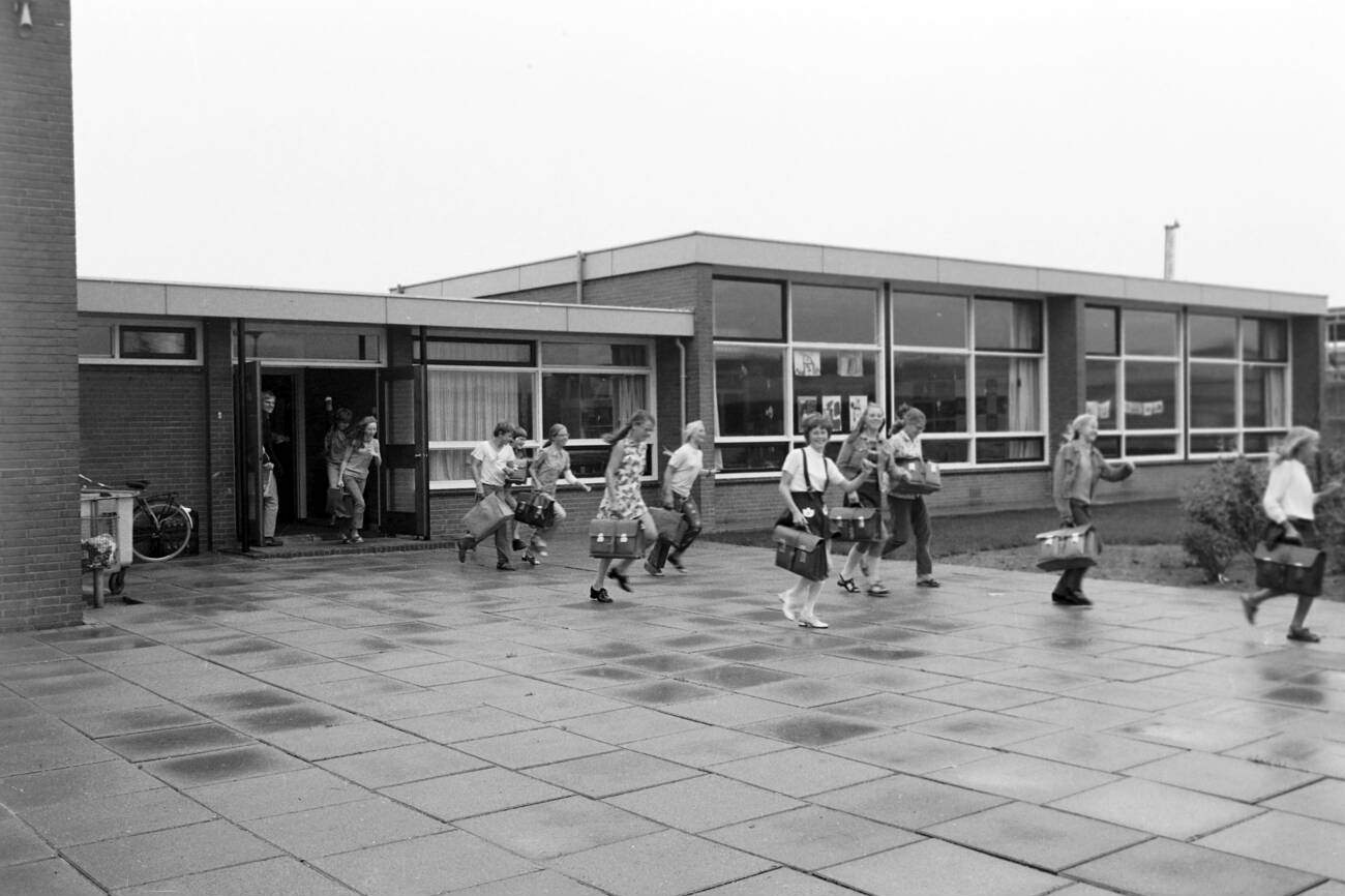 Pupils leaving a secondary modern school at Lelystad in the Flevoland province, The Netherlands in 1971