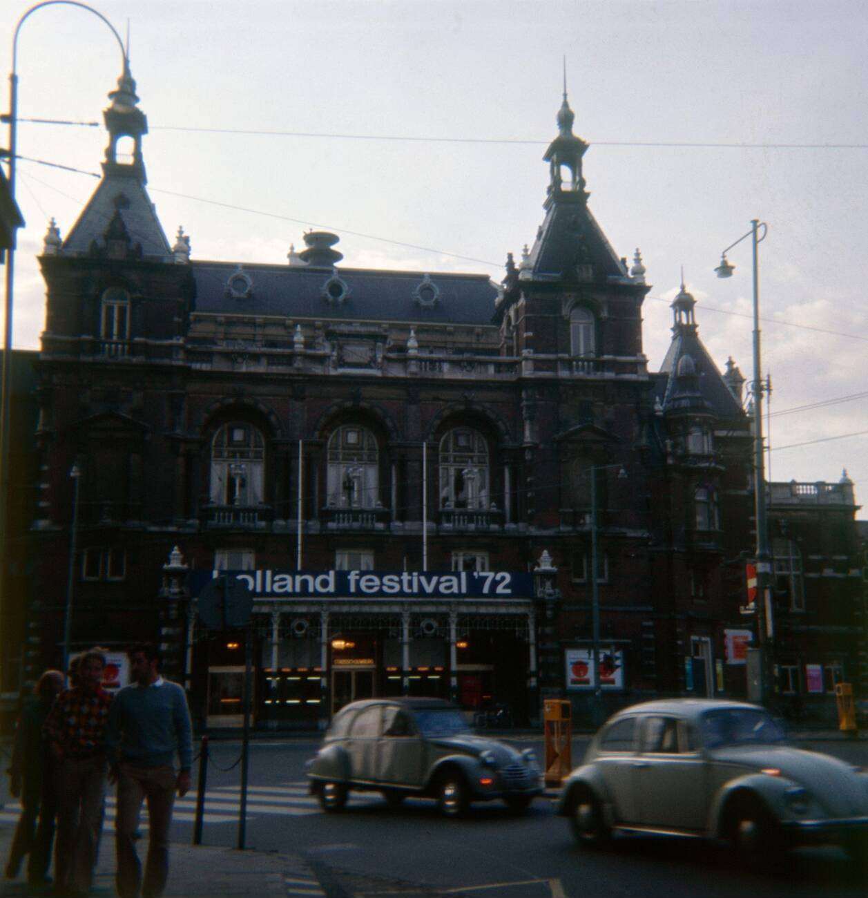 A vintage circa 1972 photograph of a building in Amsterdam, The Netherlands, with a banner for Holland Festival '72.