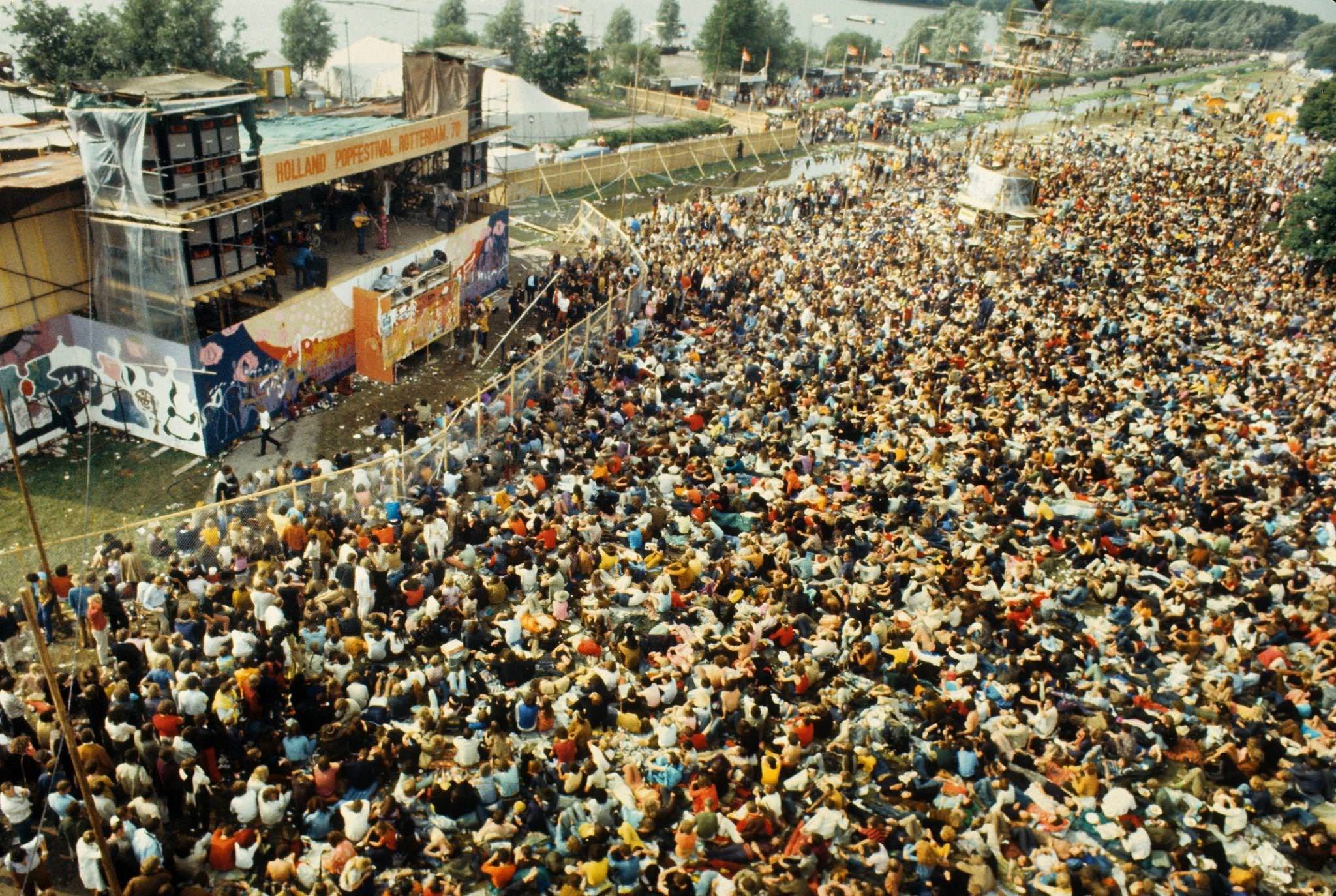 A large crowd of fans sit in front of the stage at the Kralingen festival in Rotterdam, Netherlands, June 1970.