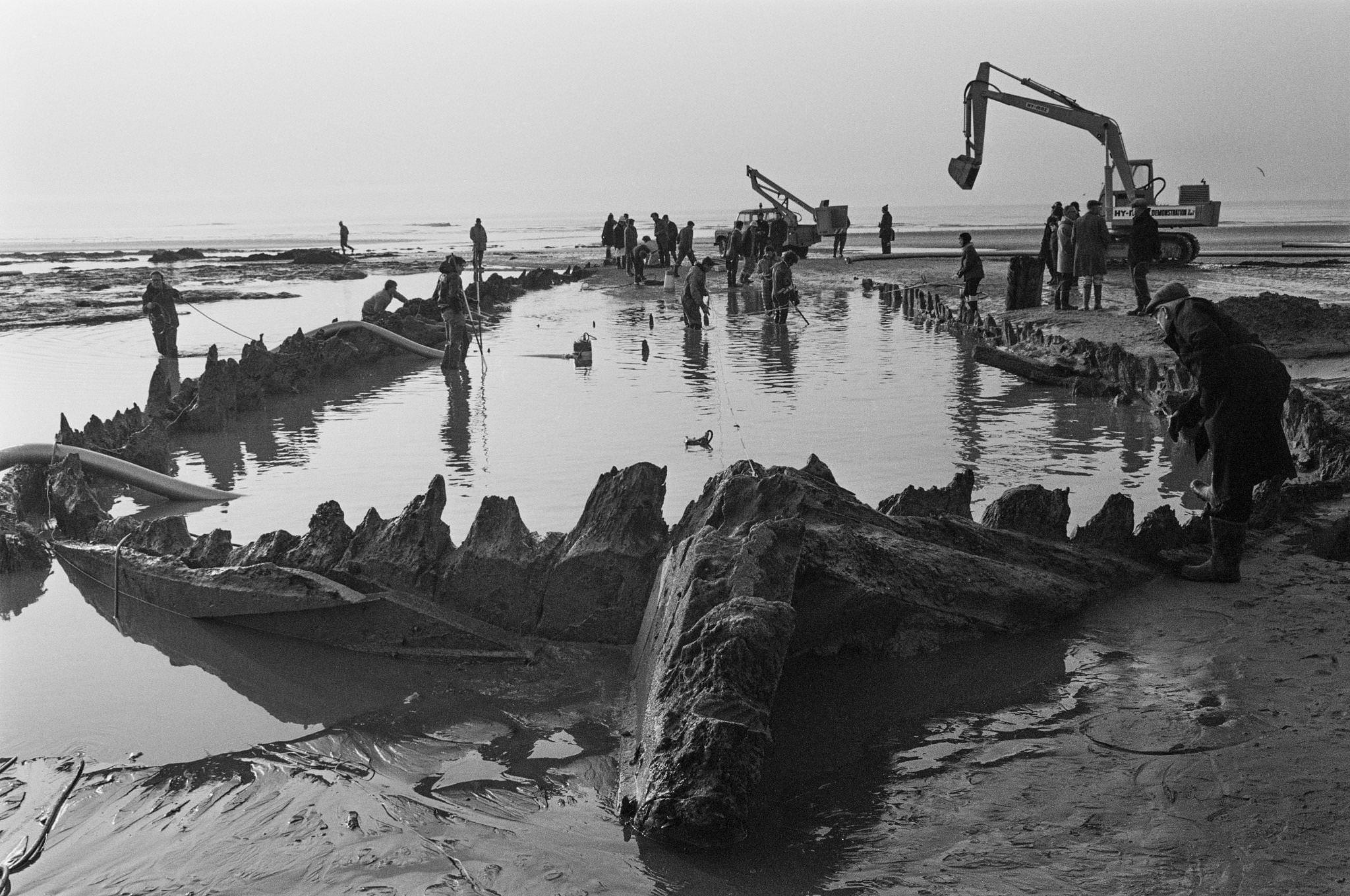 The 'Amsterdam', an 18th-century cargo ship of the Dutch East India Company, is uncovered in the muddy shore at Bulverhythe, near Hastings in East Sussex - 13th March 1970.