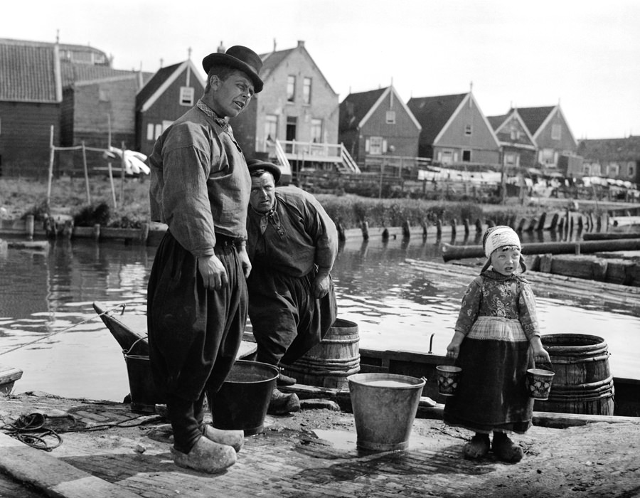 Men and girl on the docks, Marken.