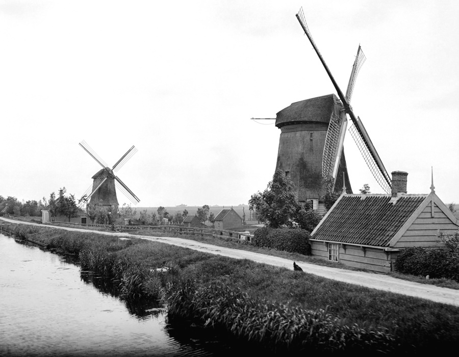 Two windmills along a canal in Landsmeer.
