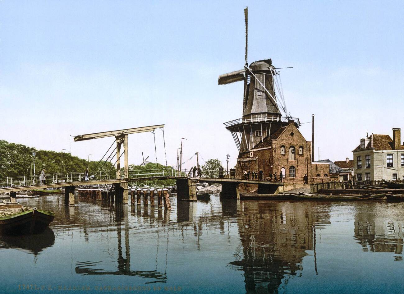 View of Catharine Bridge and windmill in Haarlem, Holland, 1900