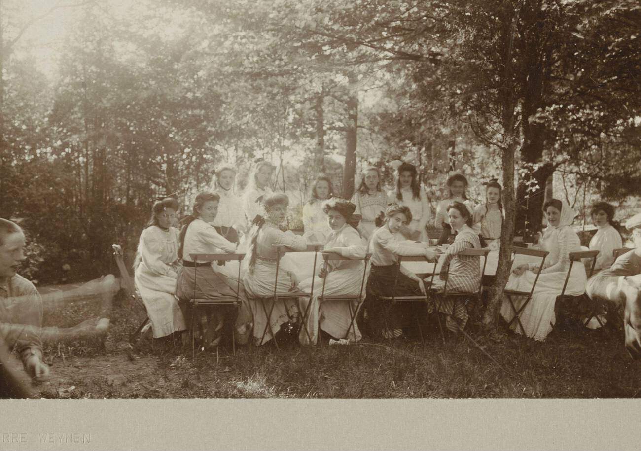 Young women at table in a forest or park, Pierre Weijnen (mentioned on object), Netherlands, 1900