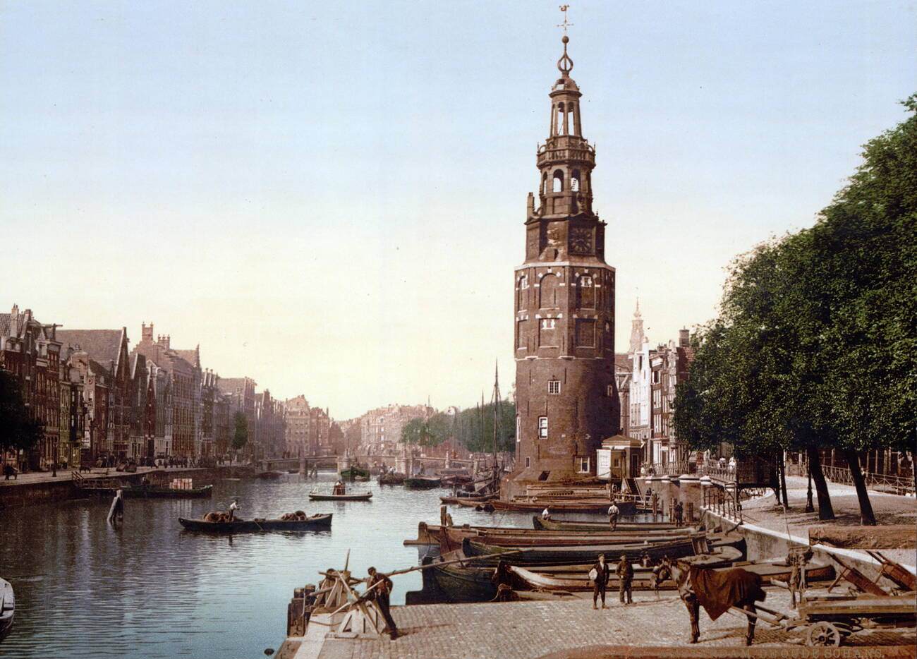 Montelbaanstoren tower on bank of the canal Oudeschans in Amsterdam, Netherlands, 1900