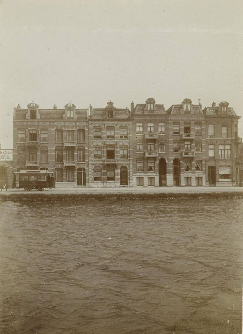 A terraced houses, located on the waterfront, Amsterdam, Netherlands, 1900