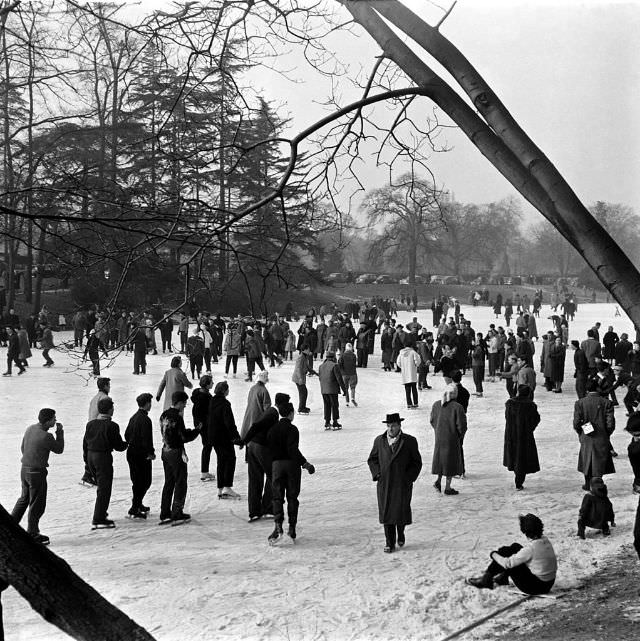 Ice skaters on the Bois de Boulogne lake, 1956.