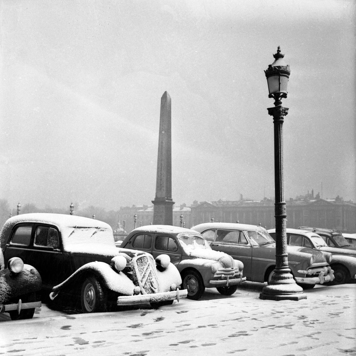 Car Covered In Snow At Place de la Concorde, Paris, January 13, 1955.