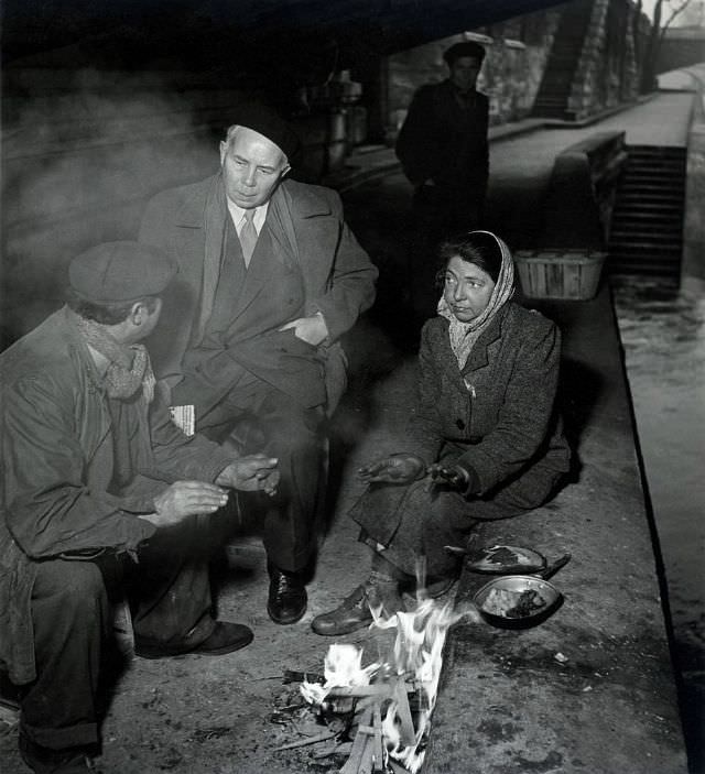 Homeless people under the bridge, 1950s.
