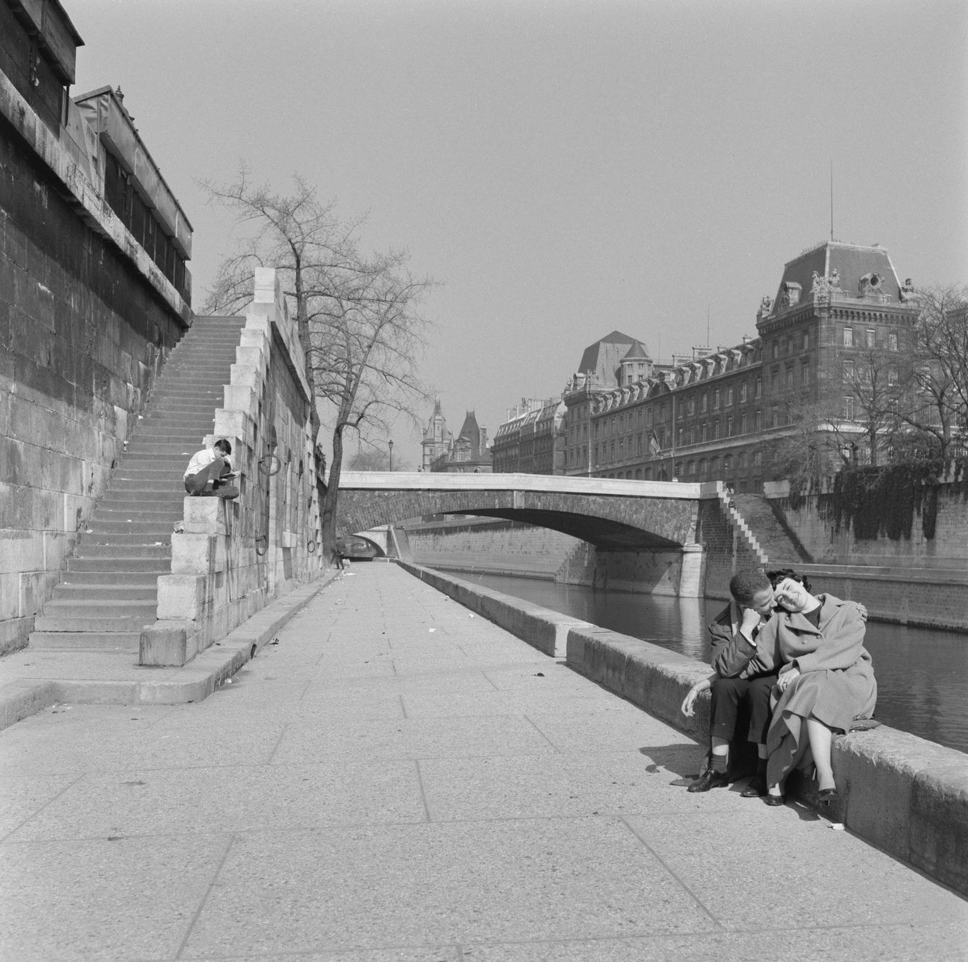Couple On The Banks Of The River Seine, Paris, April 1958.