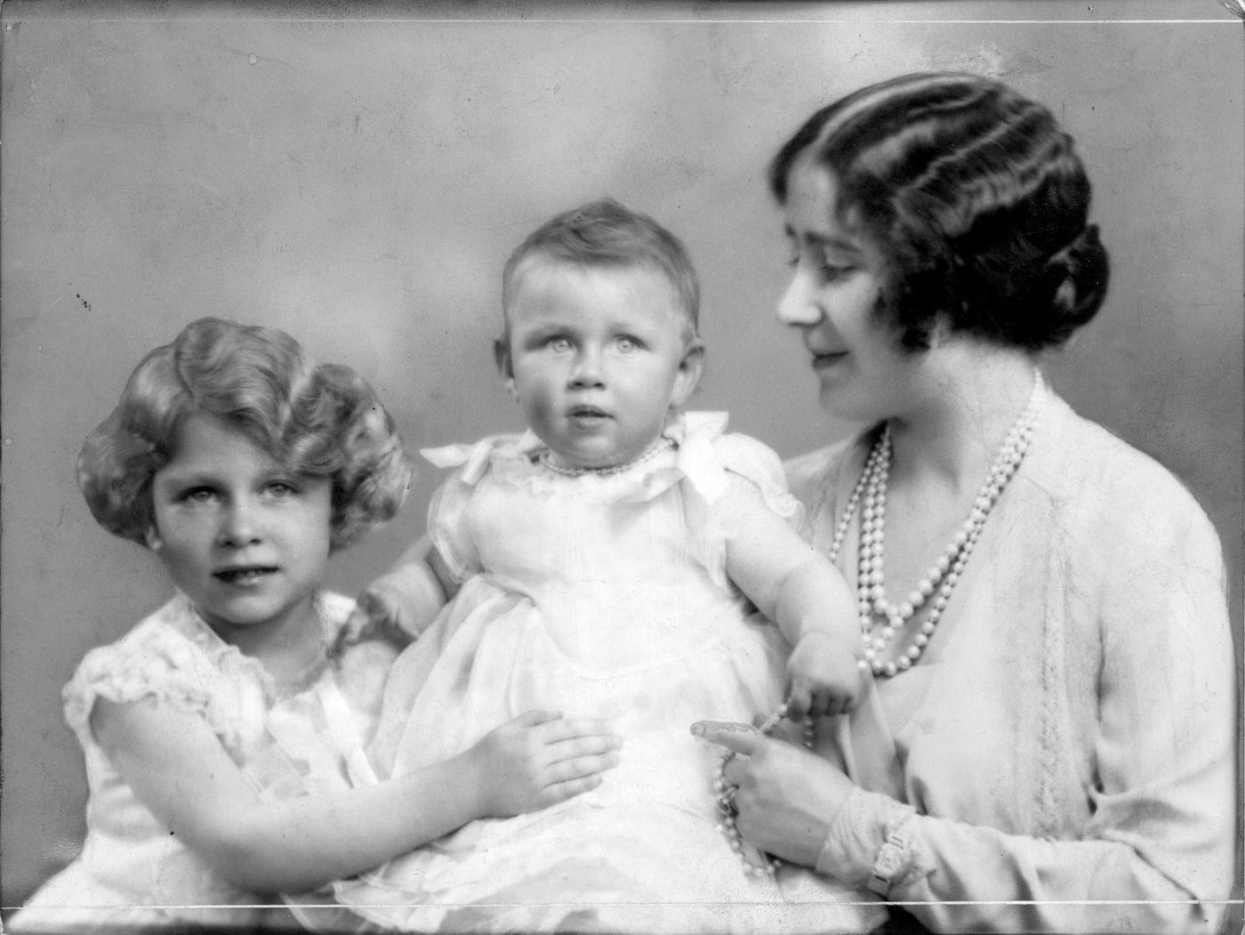 Queen Elizabeth, Queen Consort to King George VI with Princesses Elizabeth (left) and Margaret Rose, 1930.