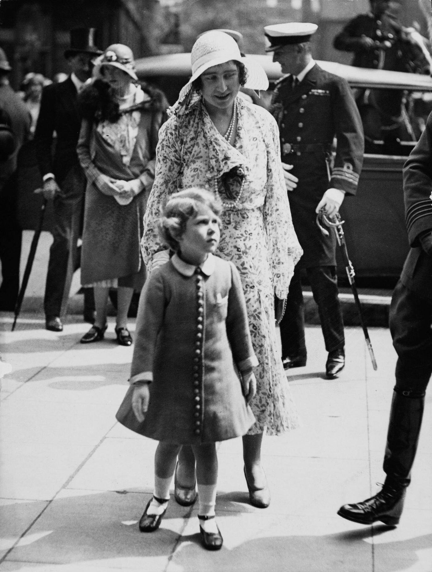 Princess Elizabeth and her mother Queen Elizabeth arrive at Olympia to attend the Royal Tournament in London in June 1931.