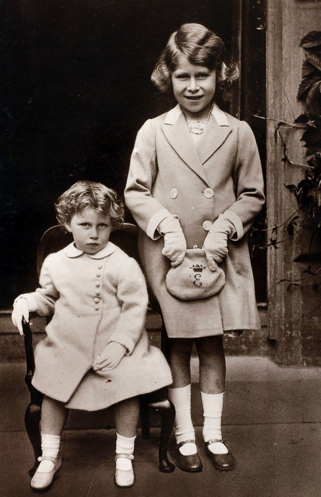 Princess Elizabeth daughter of The Duke and Duchess of York pictured with her younger sister Princess Margaret Rose.