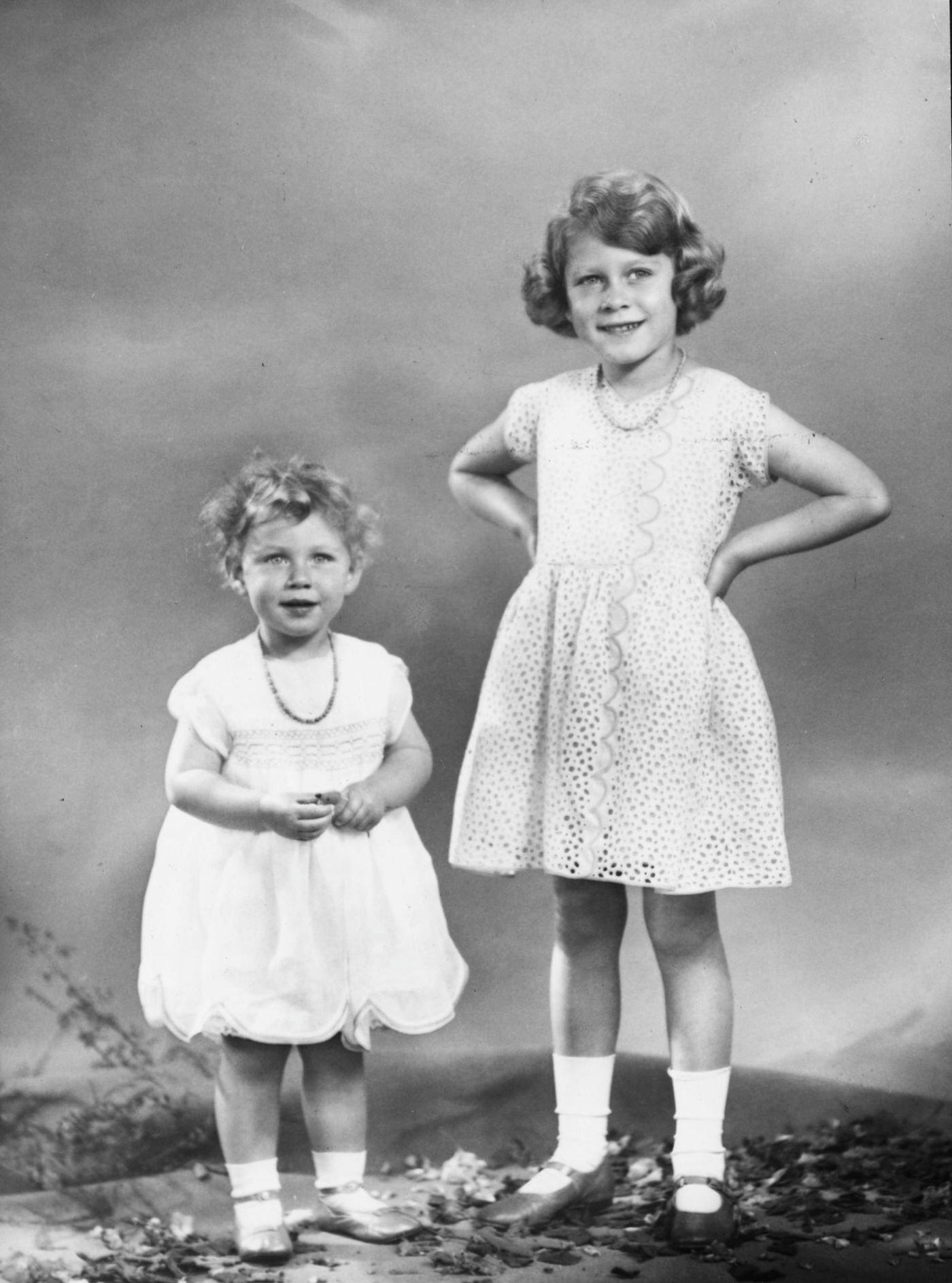 Studio portrait of Princess Elizabeth (right) and Princess Margaret in July 1932.