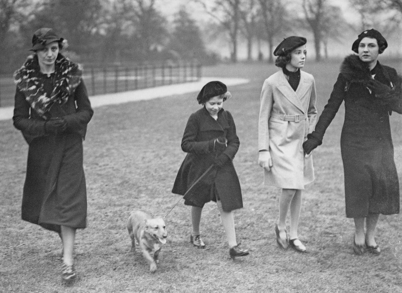 King George VI and Queen Elizabeth with Princess Elizabeth and Princess Margaret, 1937.