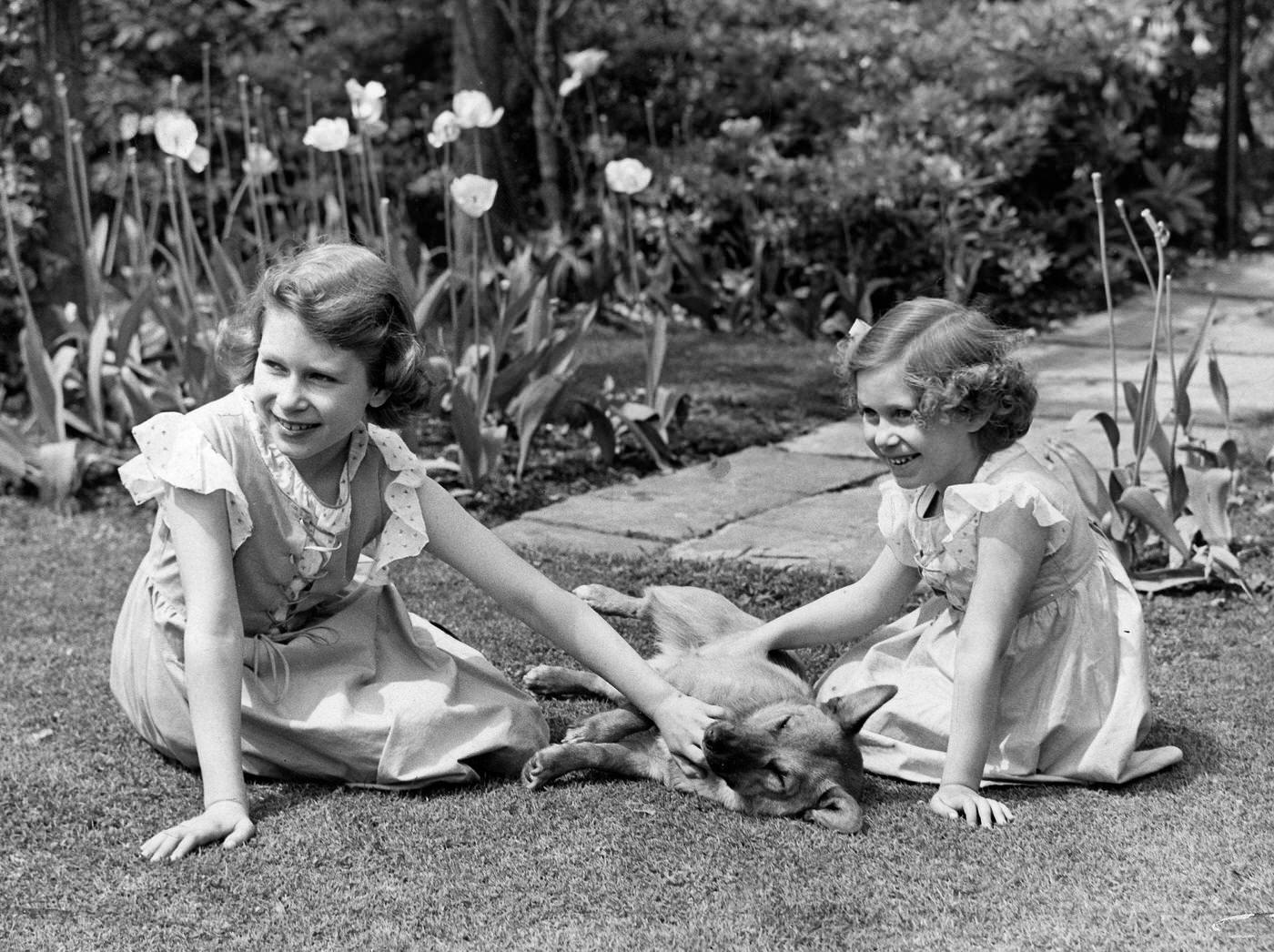 Queen Elizabeth with Princess Elizabeth and Princess Margaret, 1938.