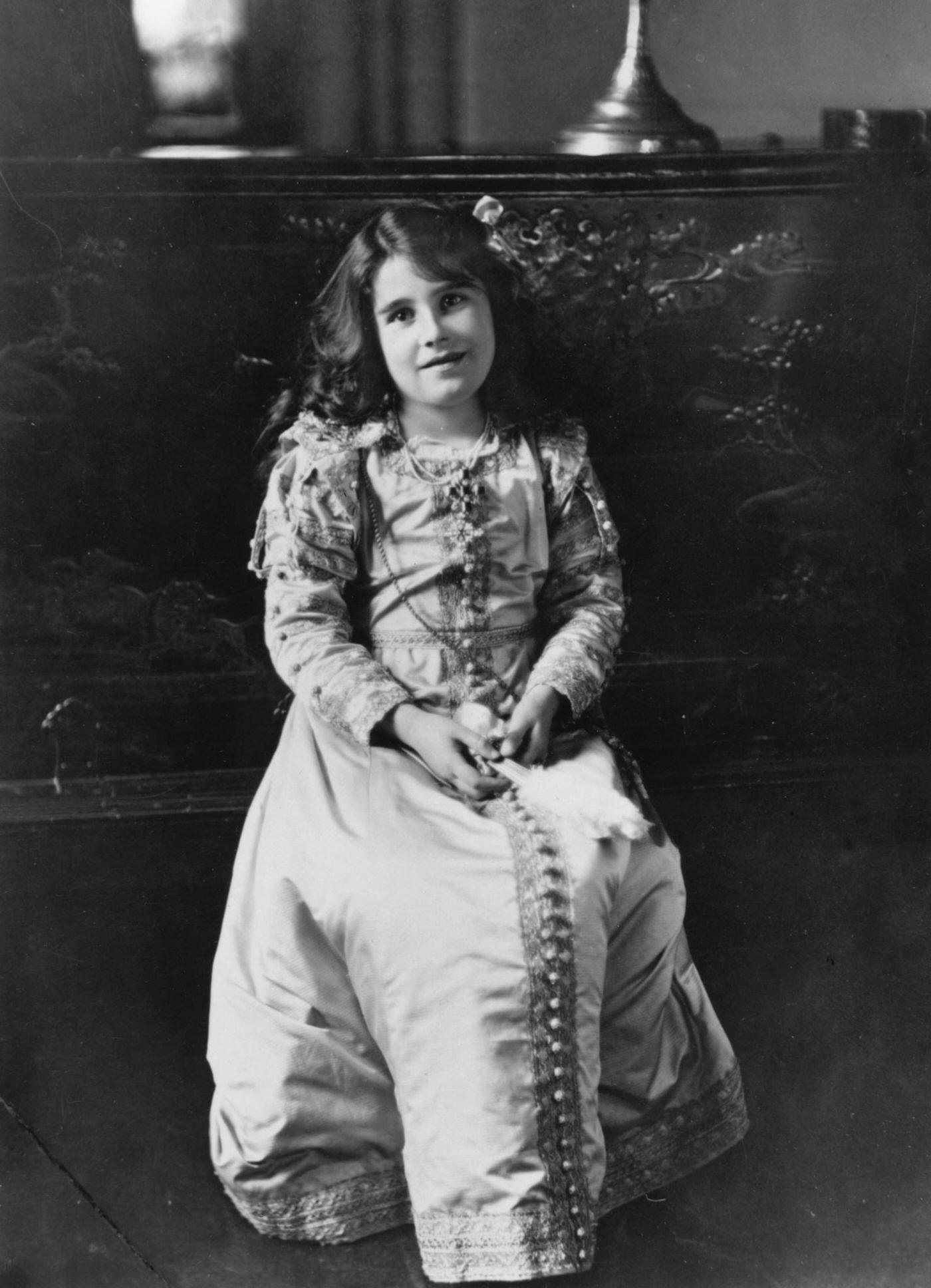 Lady Elizabeth Bowes-Lyon at Glamis Castle, Angus, her childhood home, 1909.