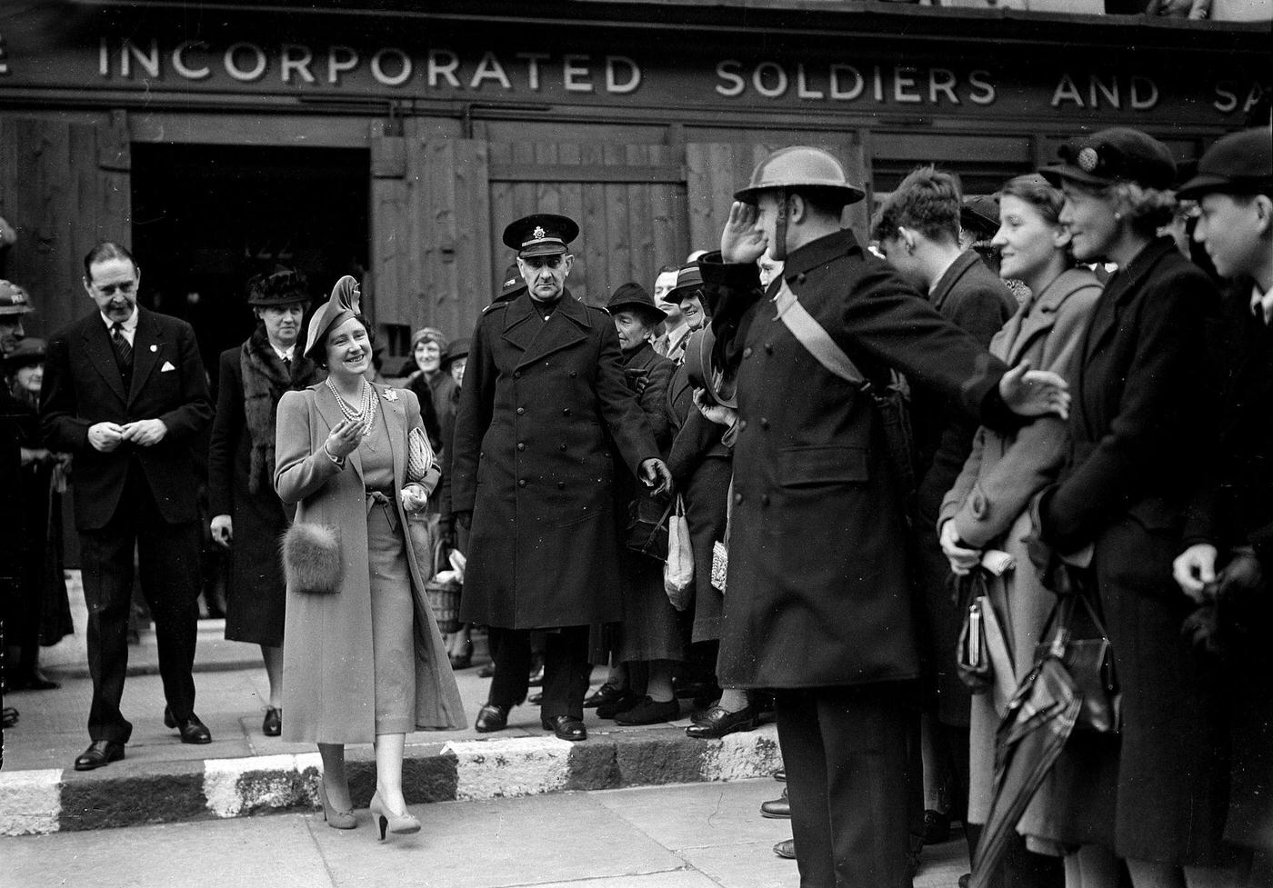 Queen Elizabeth gets a warm welcome while on an official visit during World War II.